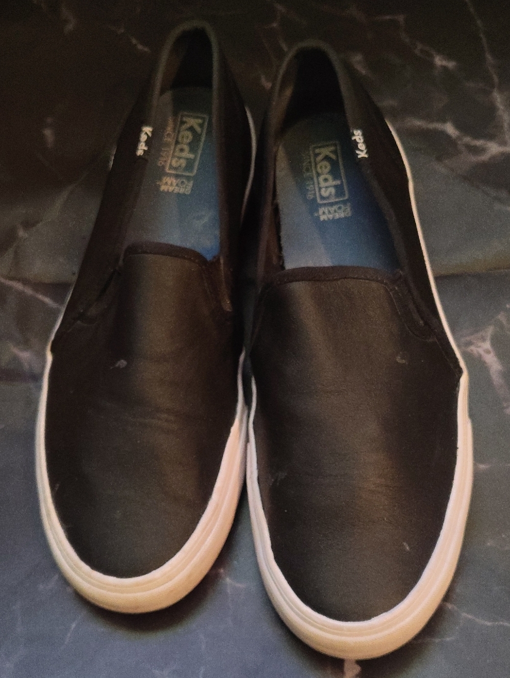 Keds Black Canvas Slip-On Sneakers with White Soles